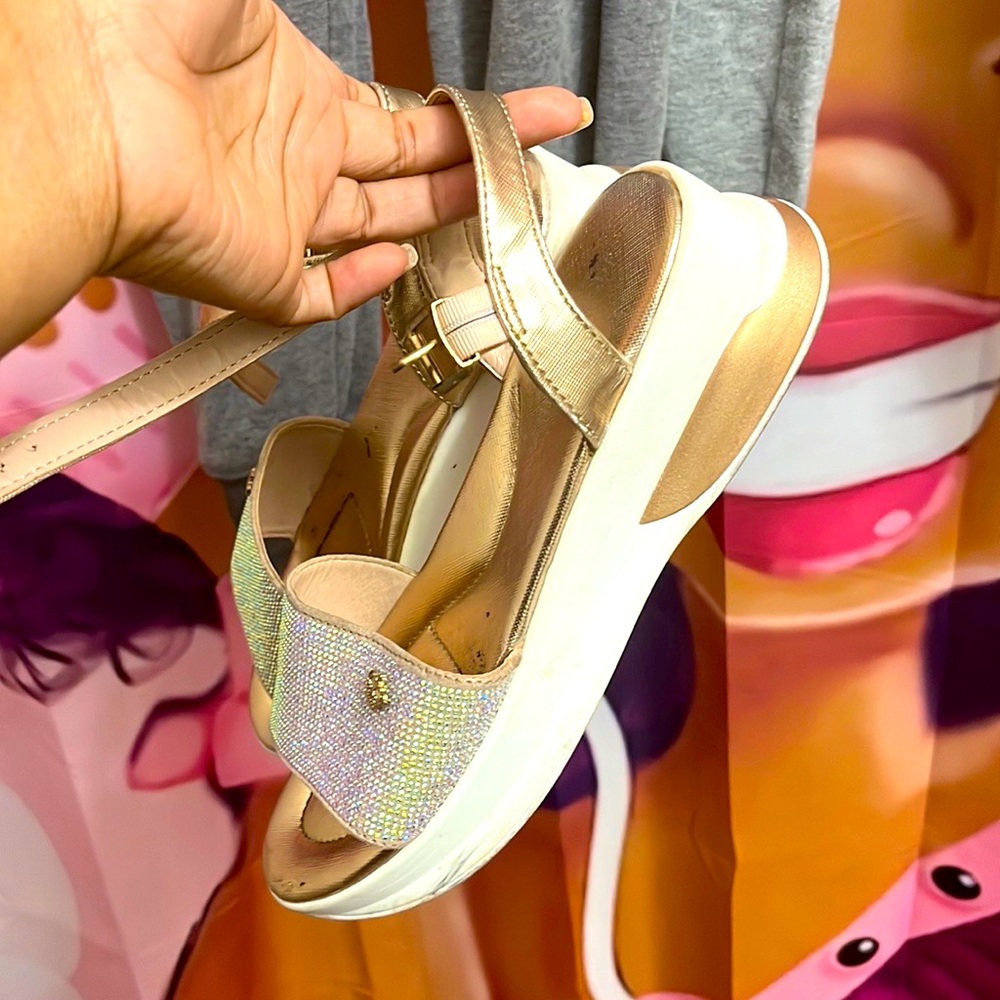 Fairly worn juicy couture, women’s size 7-7 and a half bling sandals.